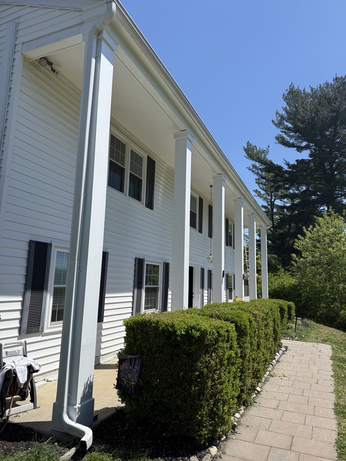 Finished exterior porch column restoration and painting